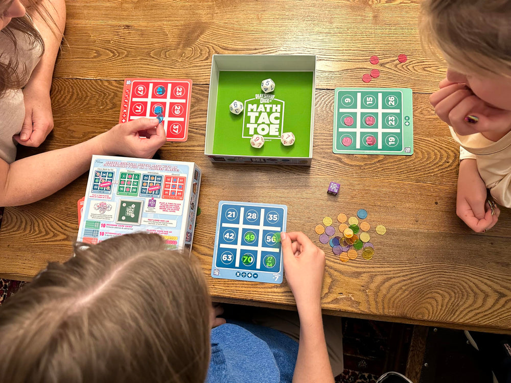 Semper Smart Games PlaySmart Dice Math-Tac-Toe dice close-up with color-coded faces