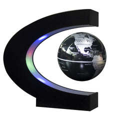 Senders floating globe with LED C-Shape frame glows as a striking desk decoration.