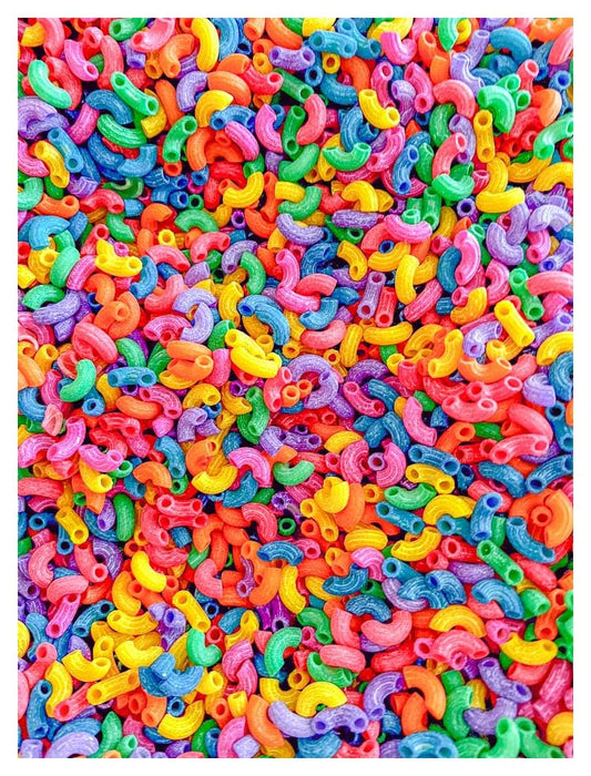 Sensory-N-Stuff rainbow elbow pasta adds vibrant color to sensory bins for creative exploration.