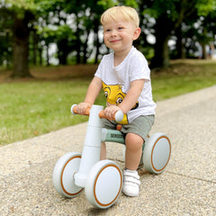 SEREED Balance Bike green outdoor scene highlights versatile use on pavement