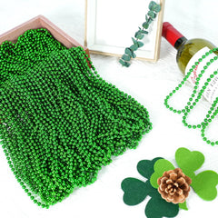 SHAOQINLIN parade favors featuring bright green beads for celebrations.