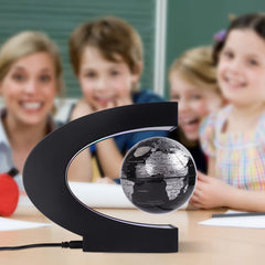 Shoclematirul globe on a desk setup highlights innovative decor for workspaces