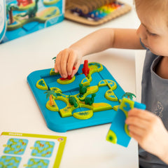 SmartGames Dinosaurs Mystic Islands dinosaur figures spark imaginative problem-solving and strategic planning.