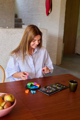 SmartGames IQ Deluxe travel case – portable puzzle set for on-the-go play.