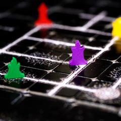 Smirk and Dagger The Night Cage candles reveal adjacent tiles, heightening tension.