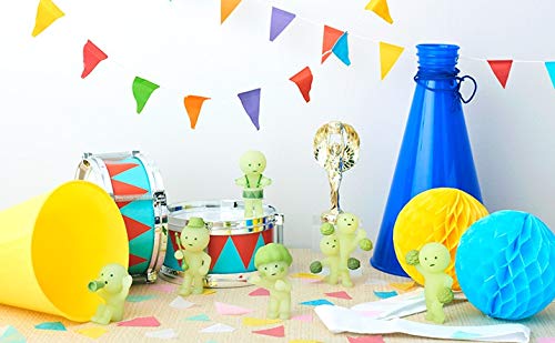 Smiski Cheer Series dancing pose glows in the dark, ideal shelf decor.