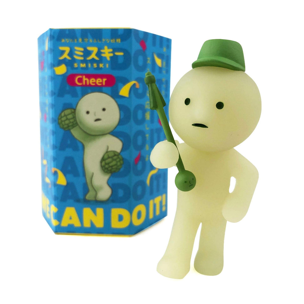 Smiski Cheer Series mini figure on drums glows in the dark for night display.