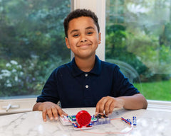 Snap Circuits FM Radio Kit modular assembly shows tool-free setup