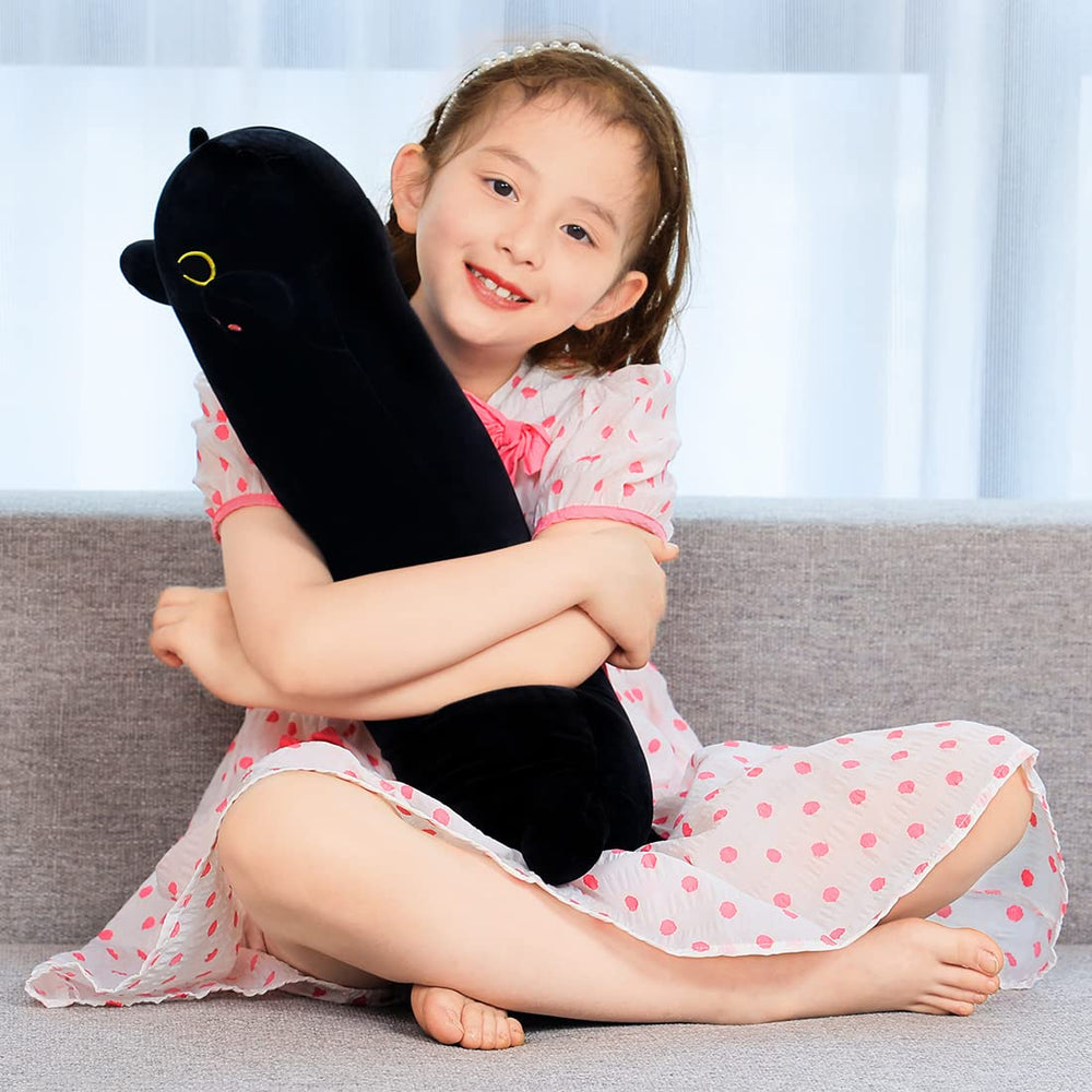SNOWOLF Black Cat Plush on sofa adds a cute décor accent