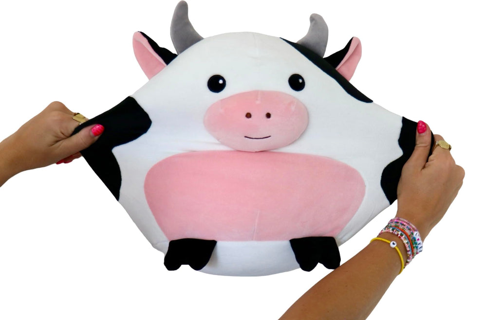 Snuggaboos Daisy the Cow Squish child hug, a comforting companion.