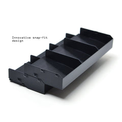 Solid Factory Settlers tray stackable design saves table space during play.