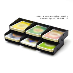 Solid Factory Settlers organizer fits original game box for tidy transport.