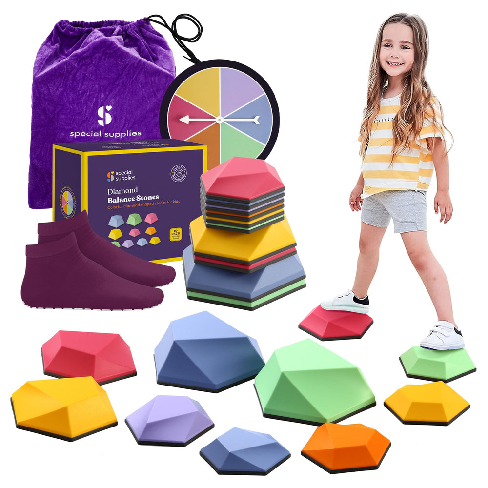 Special Supplies mountain stones arranged indoors for balance play to boost coordination.