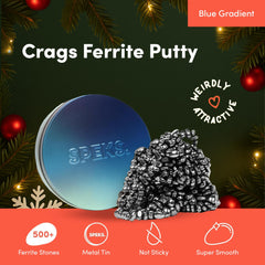 Speks Crags blue gradient tin showcases vibrant ferrite stones for colorful desk motivation.