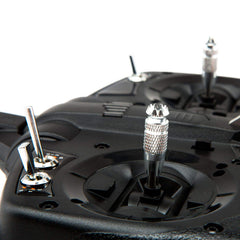 Spektrum DX6e back slider enables gimbal tension changes.