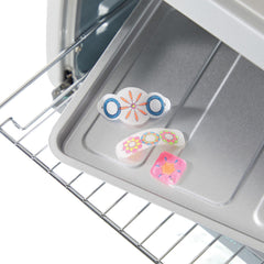 Spirograph Shrink Charms: kids draw spiral art with guidance.