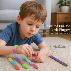 Spkwis Sensory Slap Bracelets worn on wrist during study to promote focus.