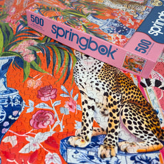 Springbok orange-pink backdrop creates dramatic contrast during puzzle breaks