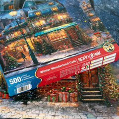 Springbok 500-piece puzzle features vibrant, collectible artwork ready for display.