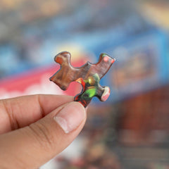 Springbok puzzle scene showcases twinkling lights and decorated trees for festive ambiance.