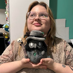 Squishable Druid Plague Doctor close-up reveals soft fur and inviting texture for cuddling.