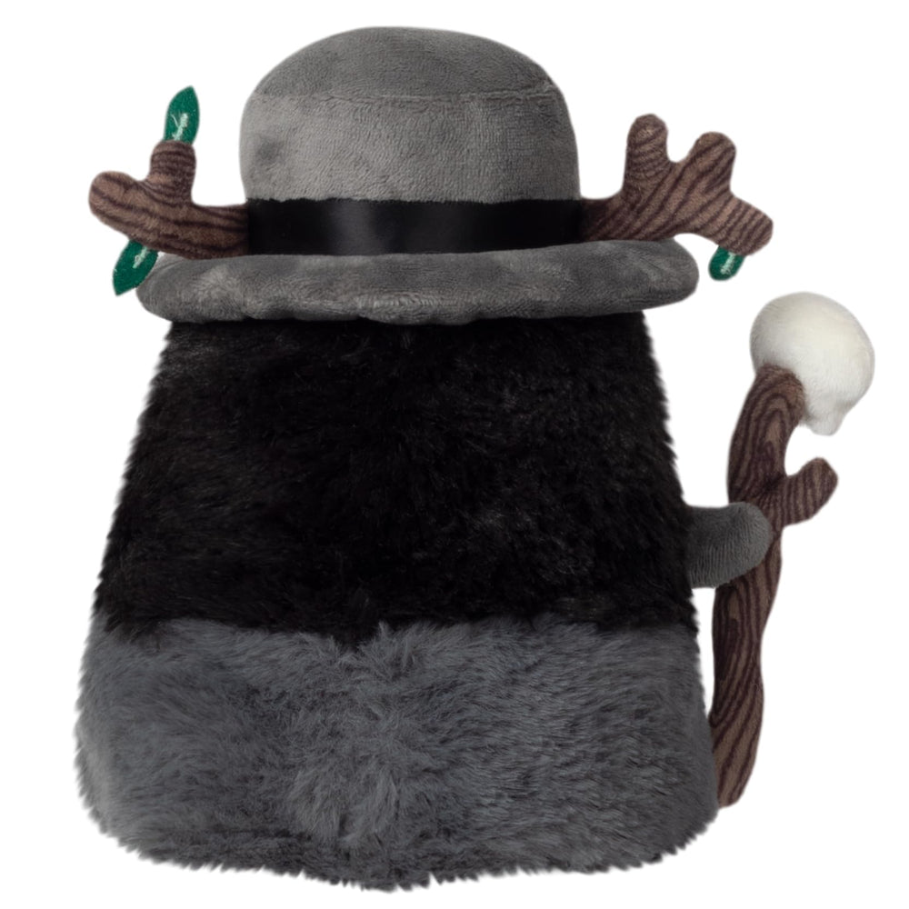 Squishable Druid Plague Doctor on a desk display adds whimsical decor and mood.