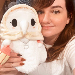 Squishable Plague Nurse plush features ultra-soft fur for comforting snuggles