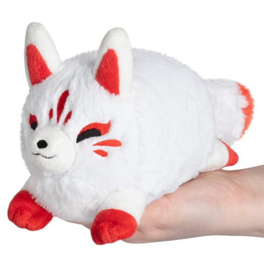 Squishable Snugglemi Snackers Kitsune palm-size plush ideal for desk or bed cuddles.