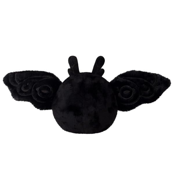 Squishable Snugglemi Snackers Baby Mothman on-desk scene, cozy study buddy.