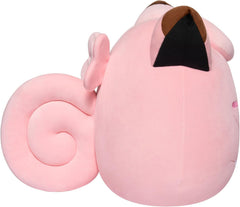 Squishmallows Clefairy plush in hand, portable comfort during long journeys.