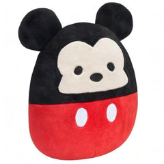 Squishmallows Mickey Mouse 8-inch plush in cozy room décor setup.