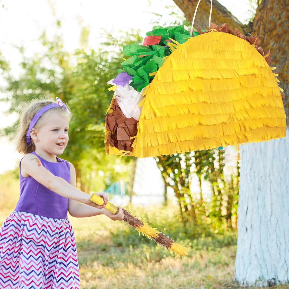 Sratte Cinco de Mayo setup with taco piñata creates lively celebrations.