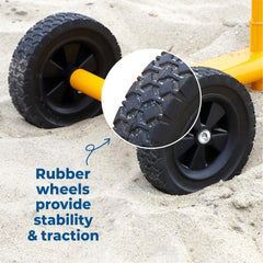 Stargo excavator toy rubber wheels on the beach for smooth rides.