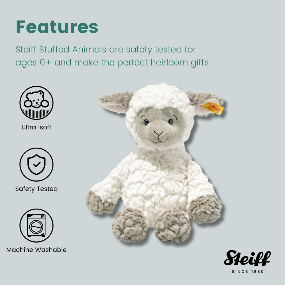 Steiff Lita Lamb 12-inch size for naps and on-the-go companionship.
