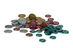 Stonemaier metal coins for Scythe and Expeditions on table, enhancing tactile gameplay.