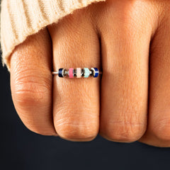 STORYJEWELLERY fidget ring in hand demonstrates calm rotation for daily focus.