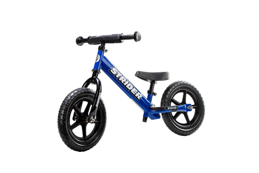 Strider balance bike 12-inch blue front view showing safe, lightweight design for young riders.