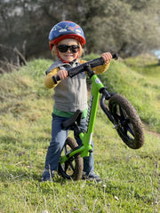 Strider logo on green frame reinforcing brand visibility.