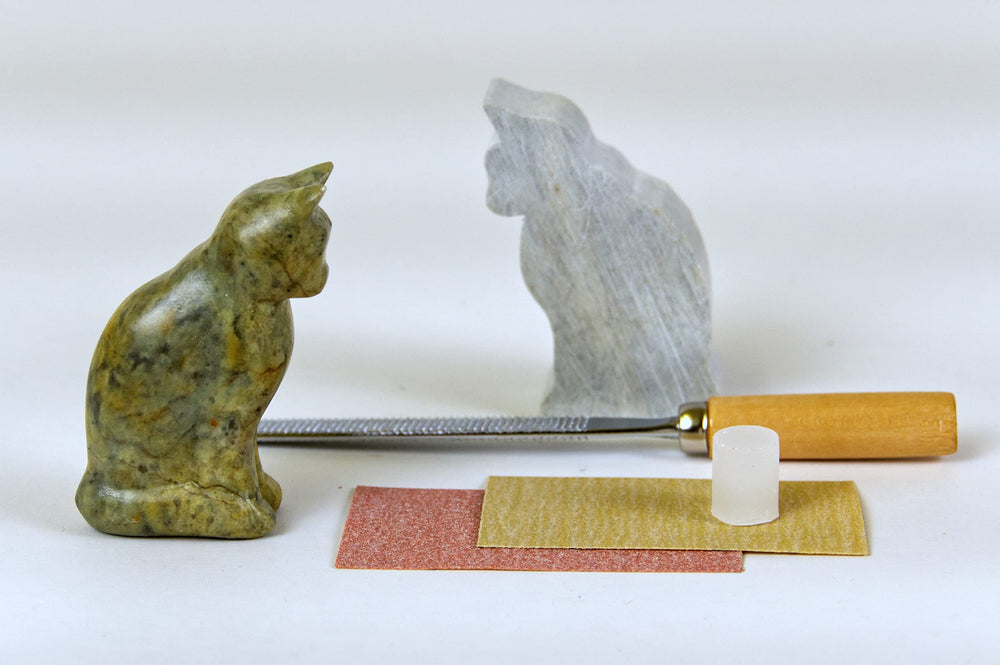STUDIOSTONE Creative rasp tool in hand for precise carving and detail.