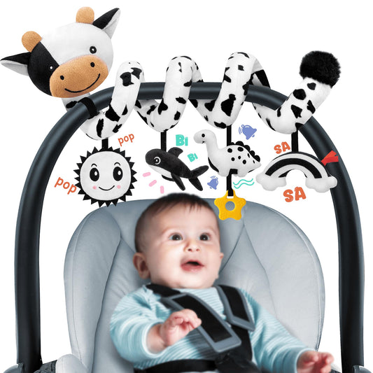 Stuffed Spiral Cow Toy hanging enhances newborn visual tracking and exploration.