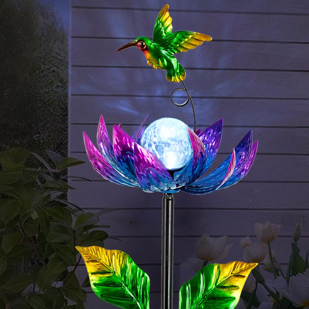 Sunnylight solar wind spinner with cracked glass ball adds color to your garden at dusk.