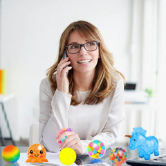 SUNPROUND stress balls on office desk for quick breaks and concentration.