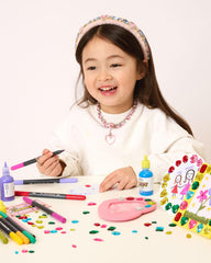 Super Smalls Sparkle and Cherish Frames Kit puff paint tubes add durable color for details.