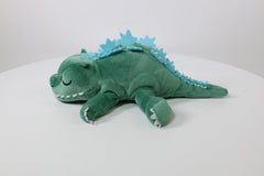 Surreal Entertainment Godzilla plush twelve-inch scale reference for size context.