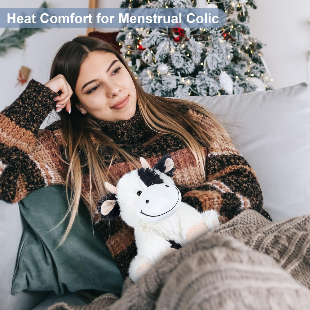 SuzziPals cow plush in use to promote relaxation and calm evenings