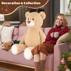 SuzziPals living room setup with a warm giant teddy bear