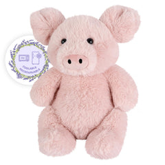 SuzziPals pig heating pad in microwave for soothing warmth.