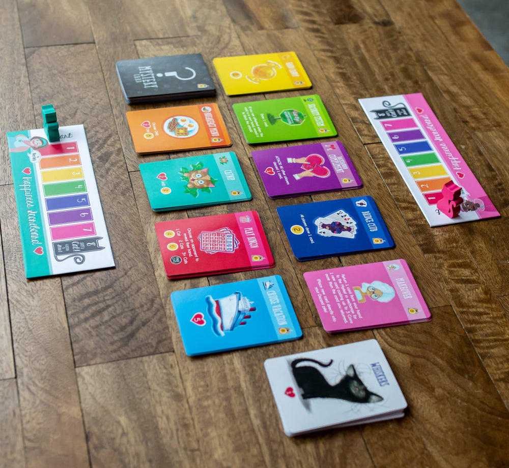 Sweet Bros Games Cat Ladies of Maple Street illustrations evoke whimsy and laughter