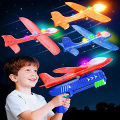 SYHLN 3-pack airplane launcher toys with LED foam planes in action for outdoor play.