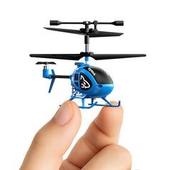 Syma mini RC helicopter in hand with shark pattern for indoor fun.